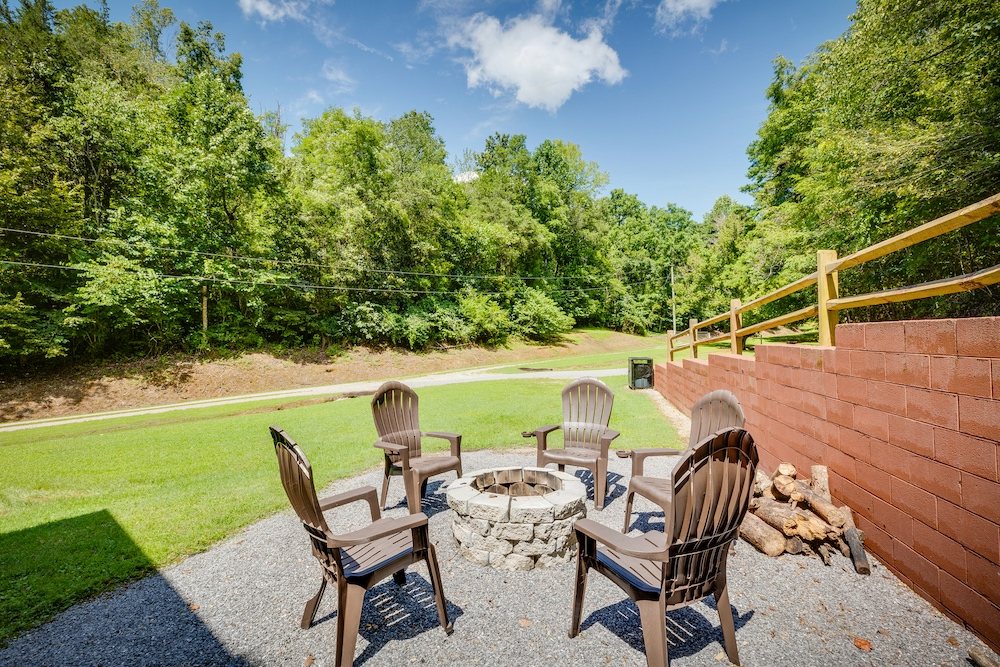 Fire pit facing the wooded hollow